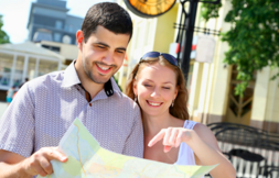 man and woman looking at a map